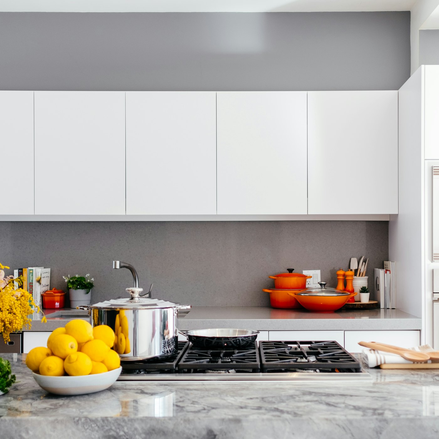 A bright modern kitchen with open shelving