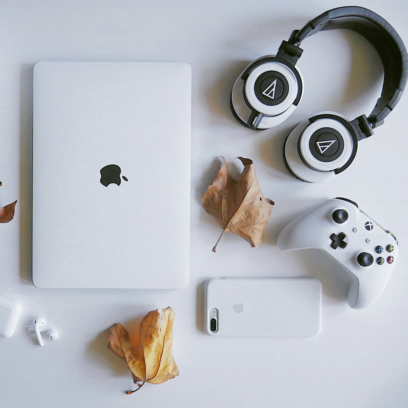 A flat lay of minimal tech accessories