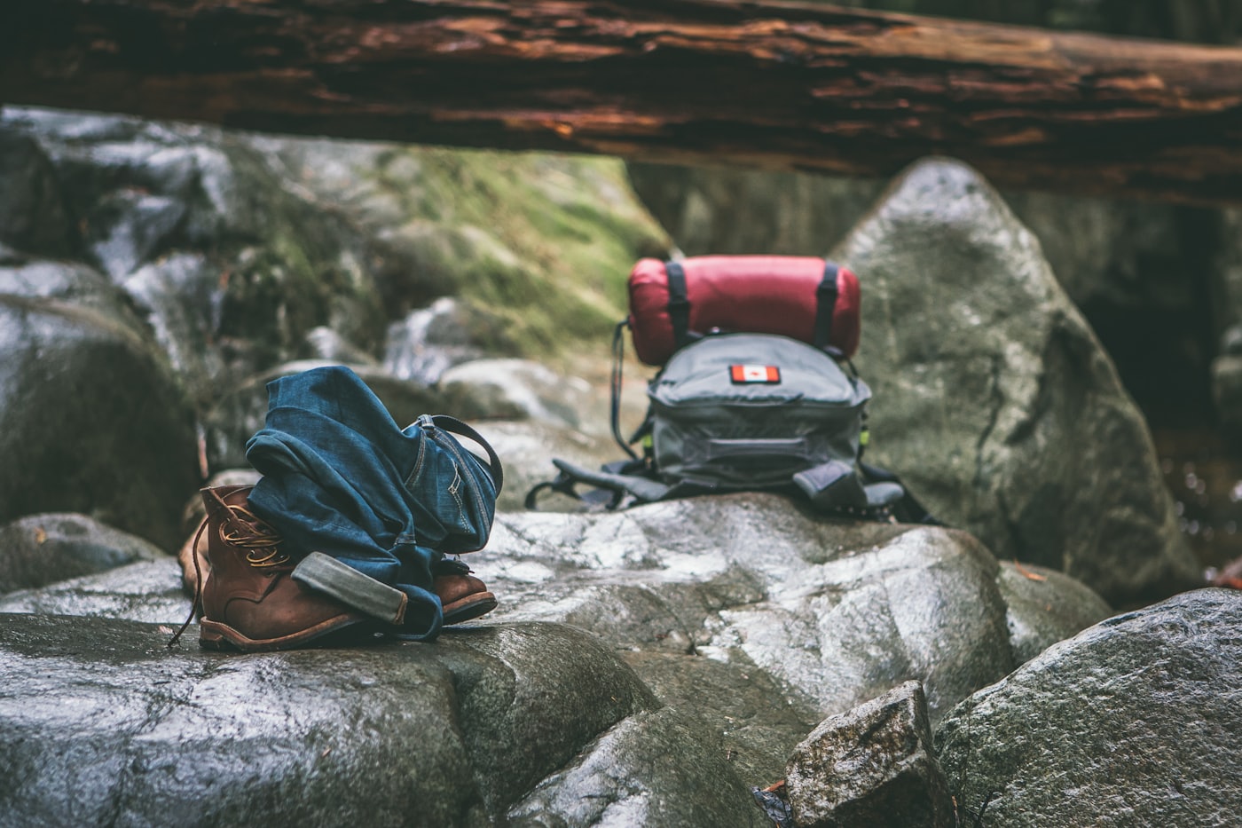 A hiker on a mountain trail at golden hour